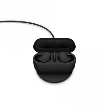Jabra Evolve2 Buds UC and wireless charging pad for business use Black Jabra Evolve2 headset in a charging case on a wireless charging pad, viewed from above.