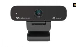 Black-framed webcam on a stand, lens in the center, Kramer logo on the right.