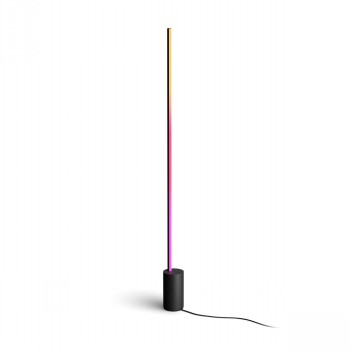 Slim black floor lamp with gradient shades from purple to yellow, round base.