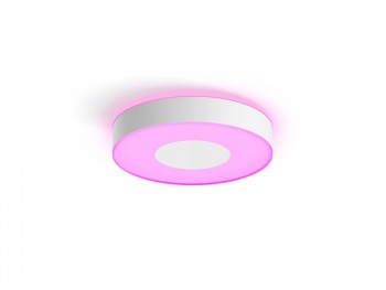 Philips Hue Infuse M round ceiling light, white frame White round ceiling light with a pink glow. Minimalist design.