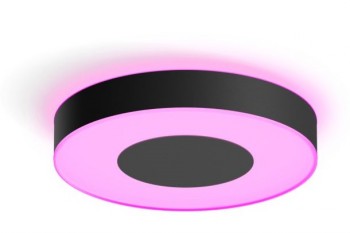 A black round ceiling lamp with edges and bottom glowing pink light.