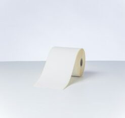 Brother thermal label roll 102 mm, 56.4 meters, continuous roll A white direct thermal label roll, width 102 mm, length 56.4 meters, placed on a white surface.