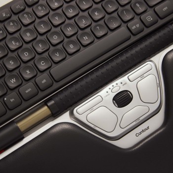 CONTOUR Rollermouse Red Plus and Balance Mid-Size keyboard, wireless combo. Close-up of a wireless CONTOUR Rollermouse Red Plus controller and Balance Mid-Size keyboard in black and white ...