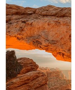 A colorful LG outdoor LED display showcased in a rocky landscape.