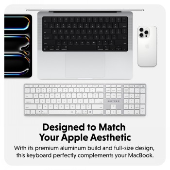 HYPER HYPERSPACE Bluetooth keyboard in silver by Targus. Wireless HYPER HYPERSPACE Bluetooth keyboard in silver, full-size, next to a MacBook.