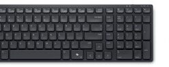 Black wireless keyboard and mouse, compact and minimalist design. The keyboard features a Scandinavian key layout.