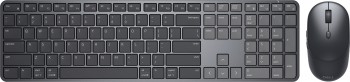 A slim black wireless keyboard and mouse with Nordic layout, photographed from above.