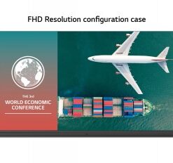 Large LG LED monitor with conference text on the left and an airplane and cargo ship viewed from above on the right.