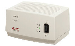 APC Line-R 1200VA voltage regulator, modern and practical design. Beige APC Line-R 1200VA voltage regulator, LED lights and switch on the front.