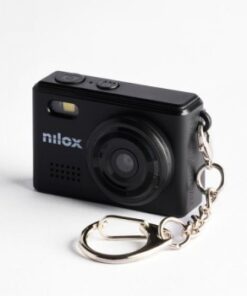 Black Nilox Mini Action camera on a table, with lens and keyring attachment visible at the front.