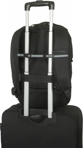 Targus Commuter EcoSmart 16" backpack attached to a suitcase A black Targus backpack attached to the back of a suitcase handle.