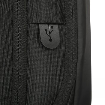 USB port of the Targus Commuter EcoSmart backpack, black 16" model. A vertical close-up of the USB port on the black Targus Commuter EcoSmart backpack.