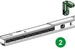 Elongated Schneider Electric Acti 9 Smartlink installation kit, includes two green corner pieces.