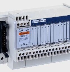 White Schneider Electric Modicon Telefast 16 relay module, connection ports and numbered indicator lights.