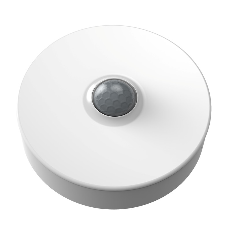 Round white motion sensor with a dark grey sensor area in the middle.
