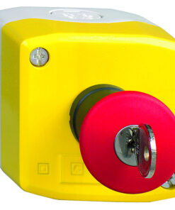 A yellow button enclosure with a red emergency stop button and a key lock in the foreground.