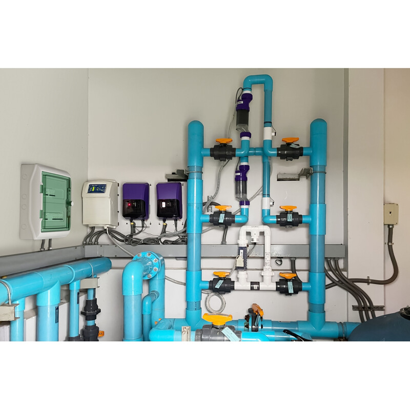Schneider Electric Kaedra electric distribution board in technical installation Electric distribution board Schneider Electric Kaedra placed in a technical room, surrounded by blue and violet pipelines and...