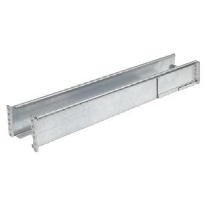 Silver-colored metallic APC Symmetra LX rack mounting rails on a tabletop.